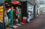 Aly Fakhry paces in front of his retail shop, Tada, as he waits for customers at the Lloyd Center, May 11, 2023. Fakhry moved his business to the mall in March, 2022, but says business has been slow and his shop has experienced a lot of theft. “The mall is trying really hard,” says Fakhry and he says things have improved in past year.