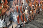 The Rogue River Indians “first salmon” ceremony ends in a feast. This weekend the cooks prepared enough salmon to feed 700 people.