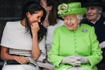 June 14, 2018: Queen Elizabeth II sitts and laughs with Meghan, Duchess of Sussex during a ceremony to open the new Mersey Gateway Bridge on in the town of Widnes in Halton, Cheshire, England. Meghan Markle married Prince Harry last month to become The Duchess of Sussex and this is her first engagement with the Queen.