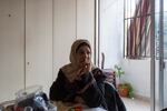 Hanan Zarura sits at her office at Beit Atfal Assumoud, a nonprofit in the Palestinian refugee camp of Shatila, Beirut, on Dec. 2, 2024.