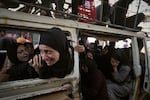 Palestinians mourn their relatives killed from an Israeli army bombardment of Gaza, at Shifa Hospital in Gaza City, Tuesday.