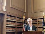 FILE: Gov. Tina Kotek addresses reporters to mark 100 days in office in April.