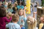 Lova Robinson, 4, plays with bubbles at the Bumble Art Studio day care in Astoria, Ore., Friday, Sept. 2, 2022. From Oregon to New York, demand for child care far exceeds supply. Families are growing increasingly desperate as providers deal with staffing shortages exacerbated by the coronavirus pandemic as well as historically low pay worsened by inflation.