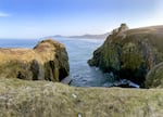 These cliffs at Yaquina Head, pictured here on March 16, 2023, are the terminal land point of the Ginkgo lava flow, which sprang from a fissure 300 miles away in Eastern Washington.