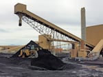 Piles of coal wait to be burned at the Intermountain Power Plant near Delta, Utah, in 2022.