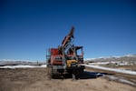 A drill rig is parked on the northeast rim of the McDermitt Caldera in southeast Oregon Jan. 14, 2022. The caldera hosts what could be the largest lithium deposit in the U.S.