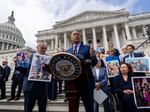 Sen. Cory Booker, D-NJ., accompanied by Senate Majority Leader Chuck Schumer, D-NY, left, and Sen. Tammy Duckworth, D-Ill., right, speaks about the need to protect rights to in vitro fertilization (IVF), before Senate vote on the issue.