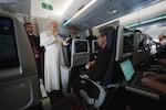 Pope Leo XIV speaks to journalists aboard the papal flight from Malabo to Rome, on Thursday, at the end of his 11-day pastoral visit to Africa.