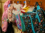 Backpacks hang outside a classroom in Woodlawn Elementary on the first day of school, Aug. 27, 2024. 