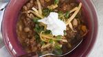 In this easy chili, use up cooked meat you have on hand. Jill Lightner’s suggestions include rotisserie chicken; sliced, chopped ham; leftover roast turkey; leftover Porterhouse steak cut into bits and frozen; or smoked turkey leg (you used half in a sandwich and stashed the rest in the freezer for just this opportunity).
