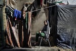 Palestinian families who had to leave their homes live with a lack of food and supplies in the tent city in Rafah, where they took shelter to protect themselves from Israeli attacks, on Jan. 20.