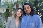 Erica Fishman, left, and Meera Menon, right, are longtime friends. Both lost their homes in Altadena this month. They're heading to Sundance Film Festival to premiere their zombie film called Didn't Die.