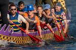 (Left to right) Portland City Councilors and some of their staff, including Will Mespelt, Councilor Sameer Kanal, back, Councilor Dan Ryan, Jacq Tjaden, Councilor Tiffany Koyama Lane, and Councilor Eric Zimmerman paddle a dragon boat on the Willamette River in Portland, May 29, 2025. Some city politicians who’ve battled in budget meetings have found a way to work together, seeing how their ability to row together on a dragon boat team could help them navigate choppy waters in City Hall. 