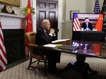 Since he took office, President Biden has only been able to meet with Chinese President Xi Jinping virtually — like in this Nov. 2021 file photo — or by phone.