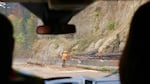 Crews work to remove trees damaged by the Eagle Creek Fire along I-84 on Sept. 14, 2017.