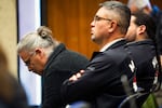 Members of the Makah Tribe listen to testimony at a 2019 administrative hearing for their request for a waiver under the Marine Mammal Protection Act. Groups including Sea Shepherd Legal and the Peninsula Citizens for the Protection of Whales testified in opposition of the waiver.