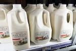 Raw milk from Raw Farm is displayed for sale at a grocery store in Torrance, Calif., on Nov. 29.