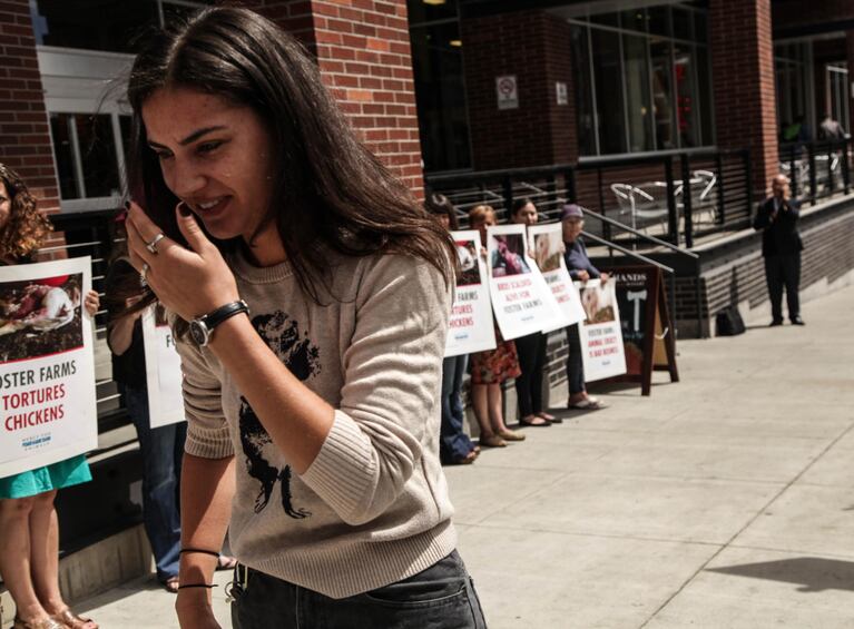 A passerby reacts to the protesters.
