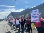 Students protest outside the Bandon School District office in June 2025 due to involuntary teacher transfers.