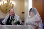 Ari and Lauren Douglas host a tisch, a traditional Jewish ceremony, before their wedding at Congregation Beth Israel in Portland, Ore. on June 15, 2025.
