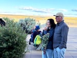 David Lee and his wife, Eka Lee, watch a guitar performance on the evening of June 20, 2025, before an early morning solstice celebration the day after. Lee organized the event, which included storytelling and yoga on the grounds of Maryhill Museum of Art.