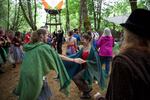 The 18 stages at the fair provide many opportunities for visitors to dance under the canopied woods.