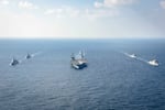 FILE - In this photo provided by South Korea Defense Ministry, warships of South Korea, the United States and Japan including the USS George Washington aircraft carrier, bottom center, take part in the trilateral Freedom Edge exercise in international waters off South Korea's southern island of Jeju, on Nov. 13, 2024.