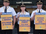 United Airlines pilots participate in a picket line at Washington Dulles International Airport on May 12, 2023. Ahead of a busy summer travel season, they're asking for higher wages and also quality of life improvements.