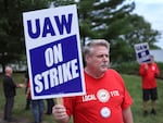 UAW workers picket outside of the Stellantis Mopar parts facility in Naperville, Ill., on Sept. 22, 2023. The UAW strike against Big Three automakers may not have much of an impact on car shoppers, though that could change.