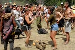 Dancers frolic in the main meadow at the 2017 gathering of the Rainbow Family of Living Light.