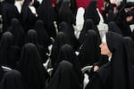 Nuns attend a consecration ceremony for four new bishops in a tent set up outside the Society of St. Pius X seminary, in Econe, Switzerland, Wednesday, July 1, 2026.