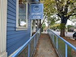 A photo of a blue building with a sign for Project Circle, which operates a psilocybin services facility in Portland, Oregon, on Oct. 23, 2024. Certified facilitators suing Oregon say the state's first-in-the-nation law allowing use of psilocybin should allow home use of the drug in some cases.