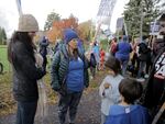 Richmond Elementary PE teacher Kelli Kellogg talks with students during a march in support of the Portland teachers strike on Nov. 7, 2023.