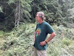 Retired U.S. Forest Forest Service firefighter Timothy Ingalsbee stands by a road in the Willamette National Forest, which was once the epicenter of the so-called Timber Wars.