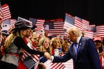 President Trump greets attendees as he walks on stage to speak on the first day of the 2026 Republican National Convention on Sept. 9, 2026 in Dallas, Texas.