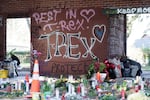 A memorial at Portland's Normandale Park, Feb. 22, 2022, where June Knightly, 60, was fatally shot and four others injured on Feb. 19, 2022. Knightly was known as T-Rex to her activist friends, according to reporting by the Oregonian.