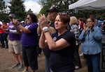Rep. Sue Rieke Smith listens to the speakers at the Labor Day picnic.