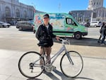 San Francisco resident Daniel Leong poses with a bike be brought to a San Francisco Public Library repair day.