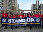 Workers at the "Big Three" US auto manufacturers went on strike on September 15, 2023, in a first-ever coordinated action to demand better pay and benefits, testing the resilience of the U.S. economy and threatening President Joe Biden's 2024 re-election momentum.