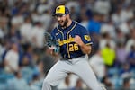 Milwaukee Brewers pitcher Aaron Ashby celebrates the final out of Game 4 of baseball's National League Championship Series between the Milwaukee Brewers and the Los Angeles Dodgers, Thursday, Oct. 15, 2026, in Los Angeles.