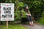 Tattoo artist Jordyn Hilton in front of her home in Portland, Oregon, on June 7, 2020.