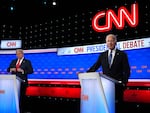 Former President Donald Trump looks at President Biden during the CNN Presidential Debate in Atlanta on June 27, 2024.
