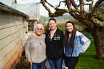 Three generations: From left to right, Esther Stutzman, her daughter Shannin Stutzman and Shannin's daughter Aiyanna Brown stand outside Esther's home in Yoncalla in western Oregon.