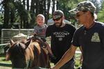 The children's corner of the festival provided fun for all ages with a petting zoo and bouncy houses.