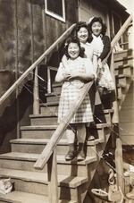 Taka Iwasaki, Noriko Kido, and Aya Iwasaki at the Adrian farm labor camp, circa 1943.