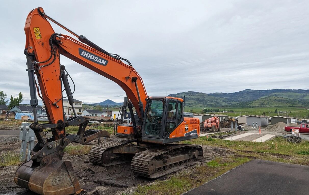 An excavator at Talent Mobile Estates in Southern Oregon, April 27, 2024. Seventy-seven new homes will be placed in the park, which was redesigned with the help of community members.