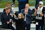 FILE - Seattle Seahawks chair Jody Allen, second from left, celebrates with the trophy after the team's Super Bowl win over the New England Patriots, Feb. 8, 2026, in Santa Clara, Calif.