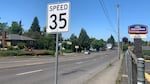 A white sign with black font showing the speed limit of 35 miles per hour on Northeast 82nd Avenue in Portland.
