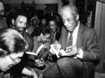 James Baldwin signing books in a crowded book store, 1980. (Photo by Afro American Newspapers/Gado/Getty Images)