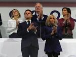 French Prime Minister Michel Barnier, background center, French President Emmanuel Macron, foreground left, and Macron's wife, Brigitte Macron, foreground right, applaud during the closing ceremony of the 2024 Paralympics on Sept. 8 in Paris.